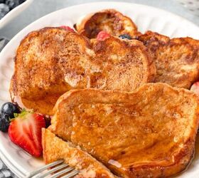 cinnamon french toast recipe, A slice taken out of cinnamon French toast with a fork