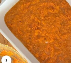 gluten free sweet potato casserole, The prepared potato layer in a white casserole dish
