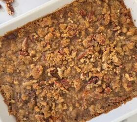 gluten free corn casserole, Gluten free sweet potato casserole in a white dish with pecans scattered around it