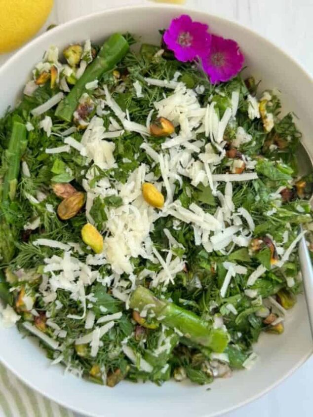 gluten free corn casserole, Cold asparagus salad with lemon herbs cheese and nuts in a white bowl