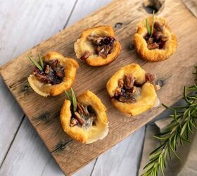 cranberry brie bites baked brie appetizer recipe, Overhead image of Cranberry Brie Bites on a wooden cutting board