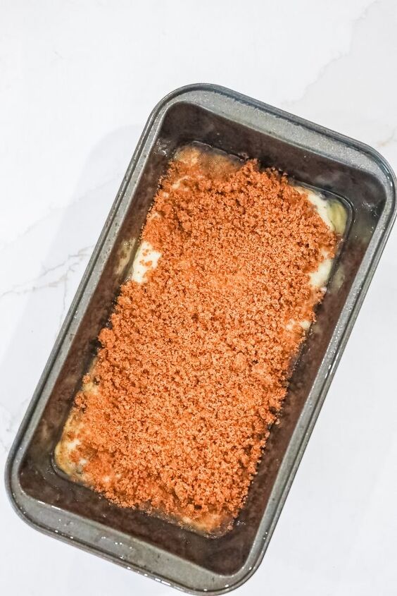 cinnamon crunch banana bread, half of the banana bread batter topped with cinnamon mixture