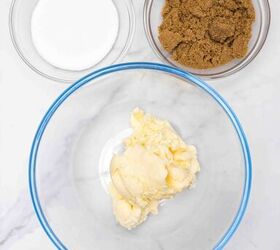 easy hot chocolate marshmallow fluff stuffed cookies, butter brown sugar and flour in bowls