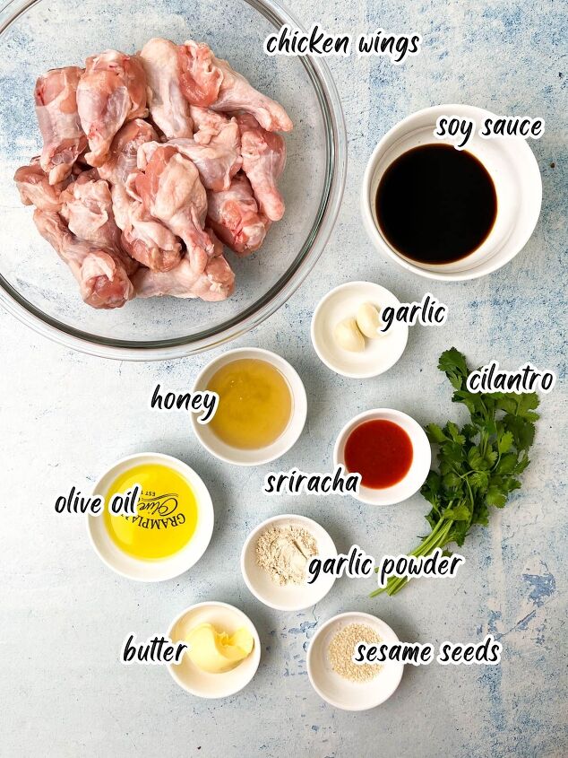 easy soy garlic chicken wings recipe, Ingredients for soy garlic chicken wings reveals chicken wings soy sauce garlic cilantro honey sriracha olive oil garlic powder sesame seeds butter and a labeled bowl of flour