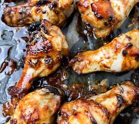 easy soy garlic chicken wings recipe, Soy garlic chicken wings and glazed baked drumsticks on a baking tray The chicken is golden brown with caramelized edges glistening with sauce