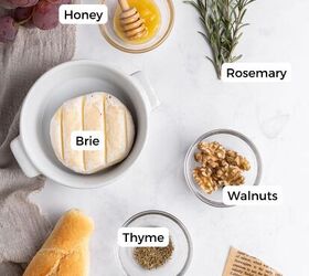 baked brie with honey, Ingredients include brie honey rosemary thyme and walnuts