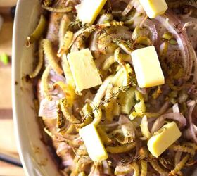 fennel braised sausages, Butter pats on top of the baked sausages and fennel