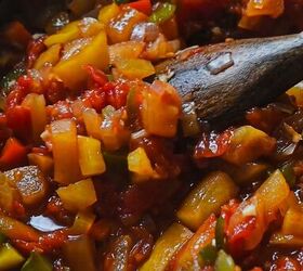 southern apple salsa, Using a wooden spoon to stir the Southern apple salsa while cooking