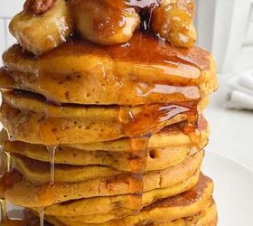 pumpkin poke cake, stack of pumpkin pancakes toped with caramlized bananas toasted pecans and syrup on a white plate