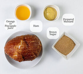 the 3 ingredient ham glaze recipe that changes everything, Overhead view of ham on a white plate surrounded by small bowls containing orange or pineapple juice prepared mustard and brown sugar Each item is labeled with text