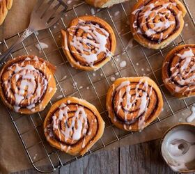chocolate cinnamon rolls indulgent breakfast recipe, Chocolate Cinnamon Rolls on a cooling rack covered in glaze
