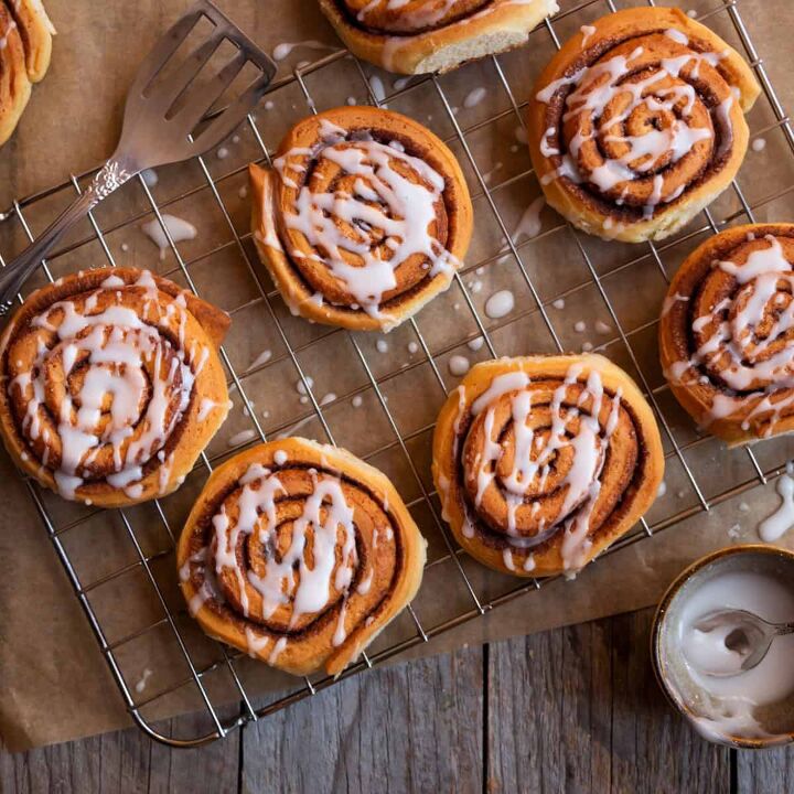 chocolate cinnamon rolls indulgent breakfast recipe, Chocolate Cinnamon Rolls on a cooling rack covered in glaze