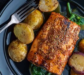 dijon salmon recipe easy baked dijon salmon, Overhead image of Dijon Salmon on a plate with baby potatoes and greens