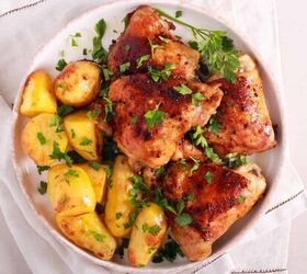 sheet pan chicken and potatoes easy sheet pan meal, Overhead image of roasted chicken and potatoes on a white plate