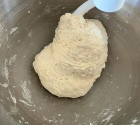 soft sourdough pretzels overnight recipe, Sourdough pretzel dough ball being kneaded in a stand machine with a dough hook attachment