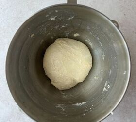soft sourdough pretzels overnight recipe, Sourdough pretzel dough ball sitting in a metal mixing bowl