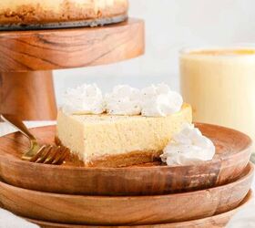 eggnog cheesecake recipe instant pot, Eggnog Cheesecake Slice With Whipped Cream and Fork