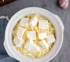 slow cooker spinach and artichoke dip, Slow Cooker Spinach and Artichoke Dip being Made in a Crockpot