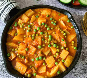 aloo matar recipe potato and peas no onion garlic, Aloo matar recipe served in a black round pan with some salad on the side