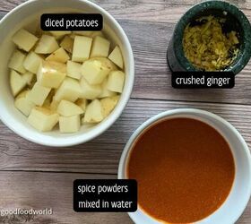 aloo matar recipe potato and peas no onion garlic, Diced potatoes placed ina round white bowl Crushed ginger placed in a pestle and spice powder paste placed in a round white bowl