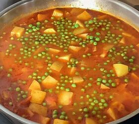 aloo matar recipe potato and peas no onion garlic, Matar alu sabzi cooking in a steel pan with spices and gravy