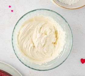 valentine s cookie cake red velvet cookie cake recipe, cream cheese frosting in a bowl