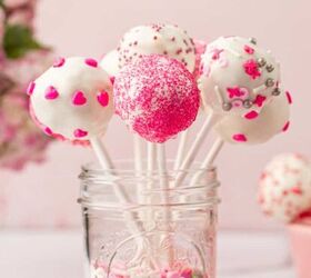 valentine s cookie cake red velvet cookie cake recipe, Homemade Valentine cake pops with cake mix arranged in a glass jar filled with sprinkles