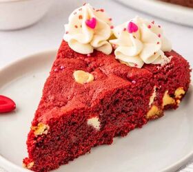 valentine s cookie cake red velvet cookie cake recipe, a piece of red velevt cookie cake in a white plate