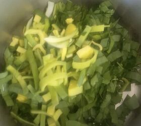 lemony green goddess chicken rice soup avgolemono style, Adding chopped greens and herbs to empty soup pot