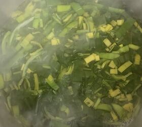 lemony green goddess chicken rice soup avgolemono style, adding broth to greens in soup pot