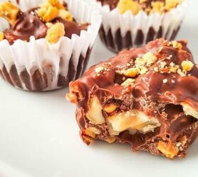 dark chocolate truffles, chocolate nut clusters on a white platter