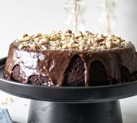 This decadent chocolate hazelnut cake is frosted with chocolate ganache and sprinkled with chopped hazelnuts
