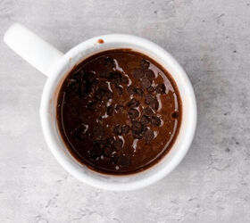easy 2 minute microwave fudgy brownie in a mug recipe, Adding chocolate chips to the mug