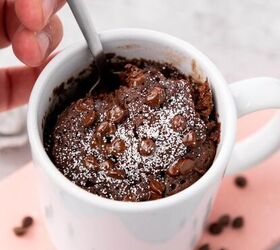 easy 2 minute microwave fudgy brownie in a mug recipe, Putting a fork into a brownie in a mug