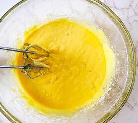 pina colada cupcakes, Batter for making pina colada cupcakes in a bowl with a mixer