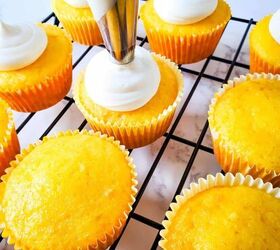 pina colada cupcakes, Baked pina colada cupcakes being frosted