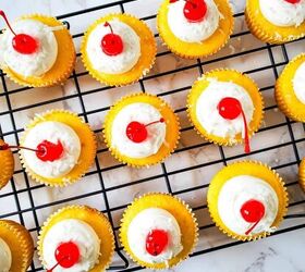 pina colada cupcakes, Frosted pina colada cupcakes on a wire rack