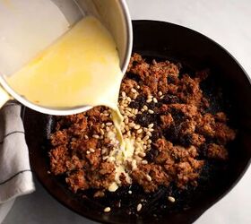 sausage pine nut currant pasta, Pouring the saffron cream in the skillet
