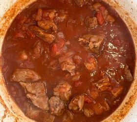 lamb stew dutch oven, Lamb pieces are put back into the stew