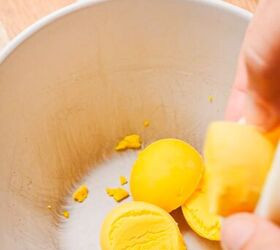 deviled eggs with lifeway farmer cheese, Separating the hard boiled egg yolks from the egg whites in a small bowl