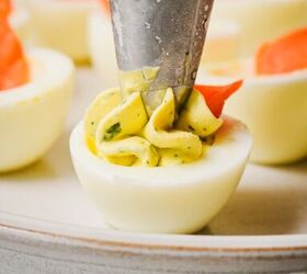 deviled eggs with lifeway farmer cheese, Using a piping bag with a tip to fill the egg whites with the egg yolk filling