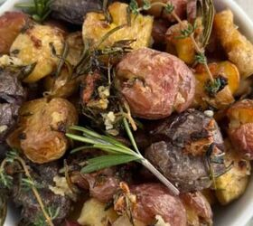 flourless chocolate cake passover, Roasted smashed potatoes in a white bowl with rosemary on top