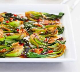 air fryer bok choy recipe crispy bok choy, Close up image of Air Fryer Bok Choy on a white plate