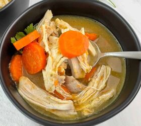 grandma s chicken soup, Grandma s chicken soup in a black bowl with a spoon lifting some out