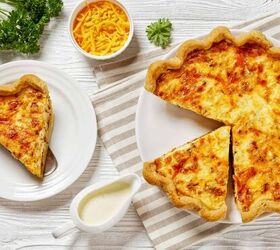 bacon quiche recipe easy bacon and cheddar quiche, Overhead image of Bacon Quiche with a slice taken out of it