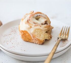 tangzhong cinnamon rolls the softest fluffiest rolls you ll ever mak, single cinnamon roll on a plate with gold fork and sprinkled cinnamon