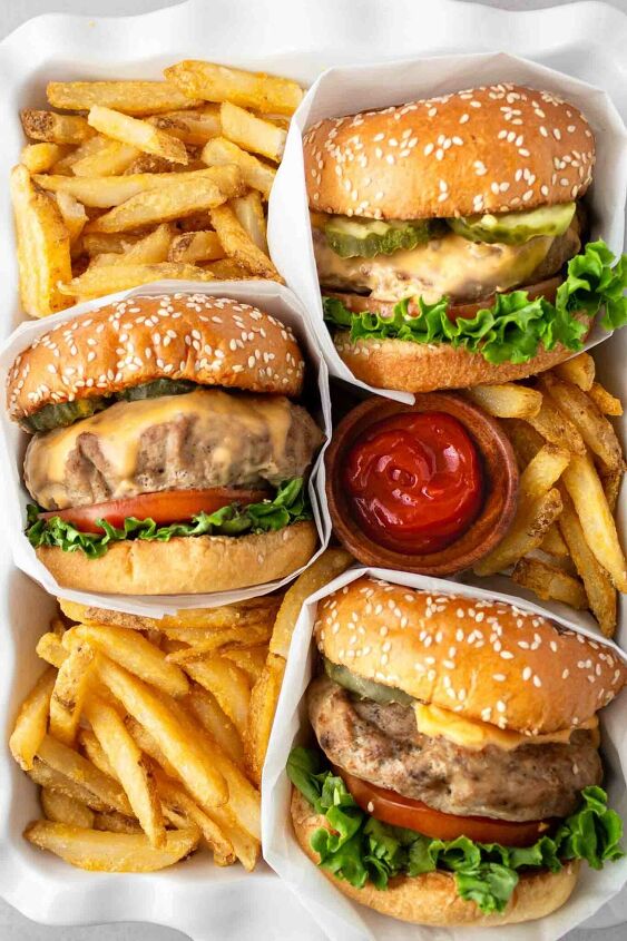 instant pot turkey burgers, turkey burgers in a white dish with french fries