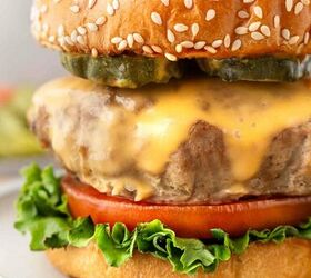 instant pot turkey burgers, closeup of a turkey burger on a bun with lettuce tomato and cheese