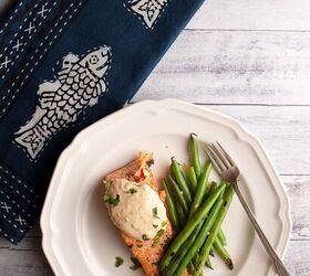 salmon with chili ginger aioli, Serving of salmon on white plate with blue napkin