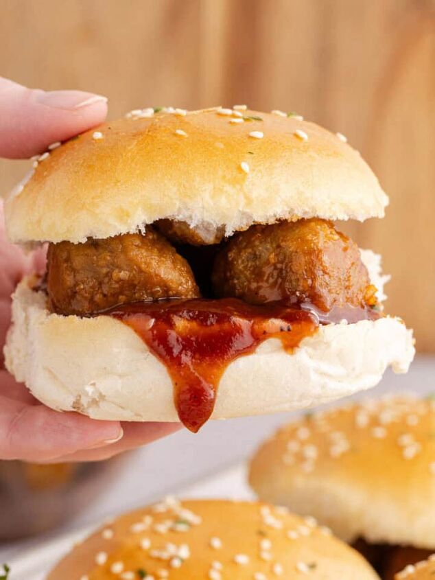 bbq pulled pork in crock pot with root beer, Meatball Sliders Being Held Close Up